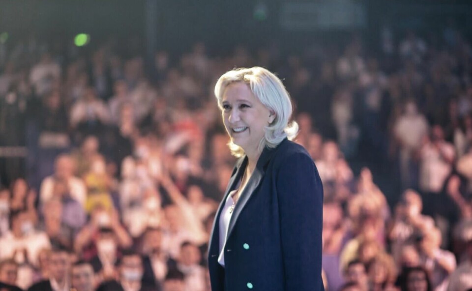 Marine Le Pen on stage at the party conference in Perpignan. Marine Le Pen reelected head of RN and restates presidential plans
