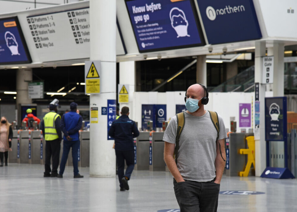 UK airport passenger with mask