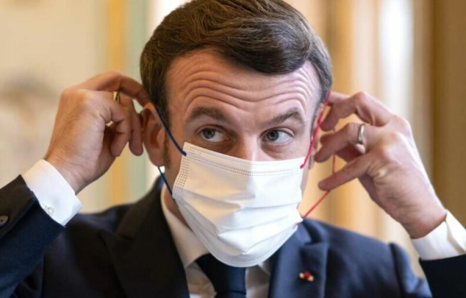 President Macron puts on a face mask. Roadmap out of lockdown in France: President Macron to hold meeting