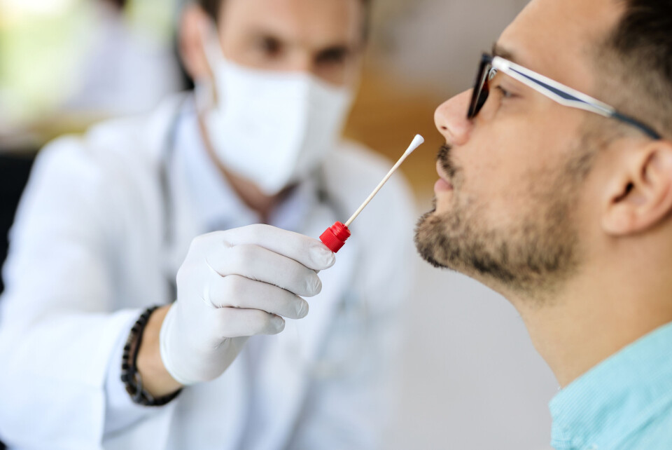 Drazen Zigic / Shutterstock A man receiving a Covid-19 test nasal swab