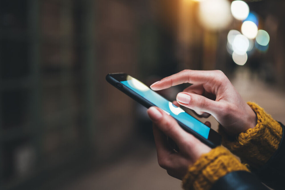Maria Savenko / Shutterstock A person using a mobile phone