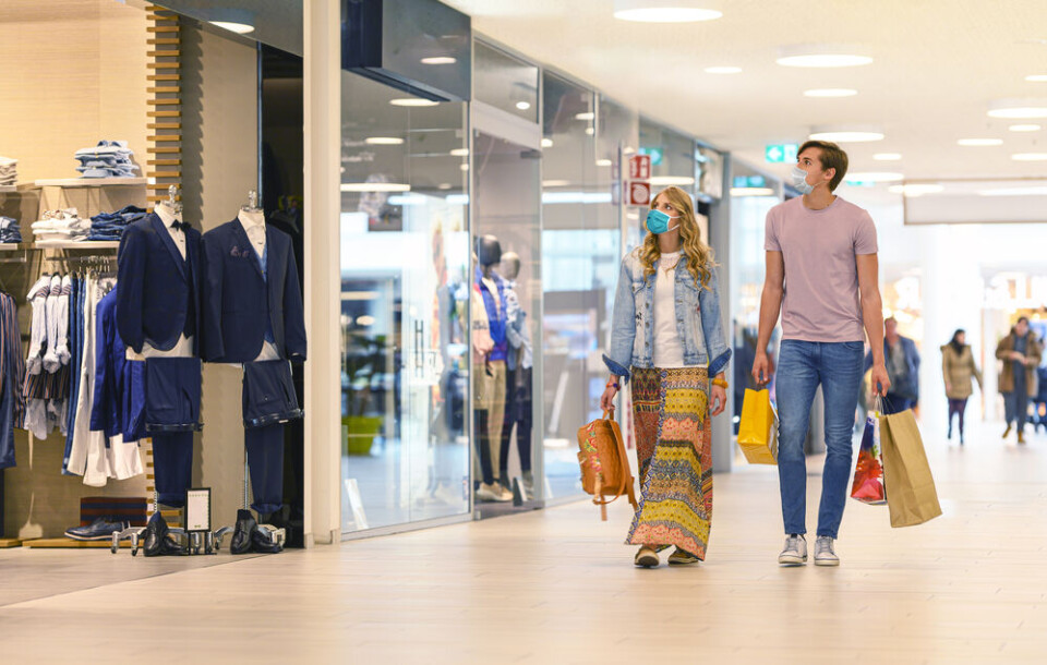 People wearing masks in a shopping centre. France extends health pass, isolation rules reviewed: 6 Covid updates