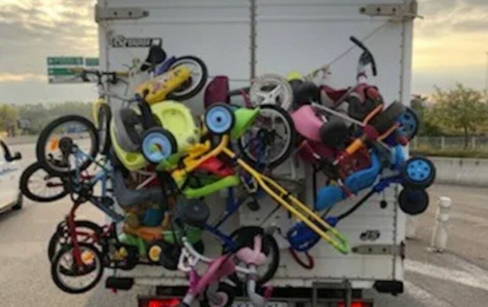 The van loaded with bikes on the road. Gendarmerie stop five tonne van overloaded with bikes in south France