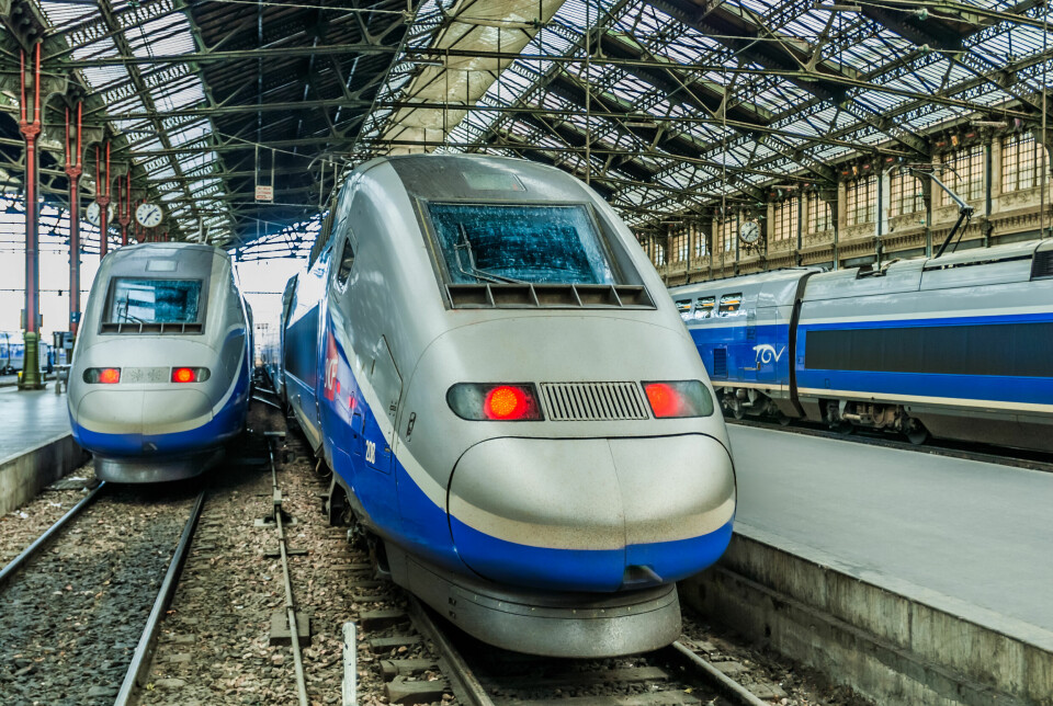 an image of three TGV trains in Paris's Gare de Lyon station