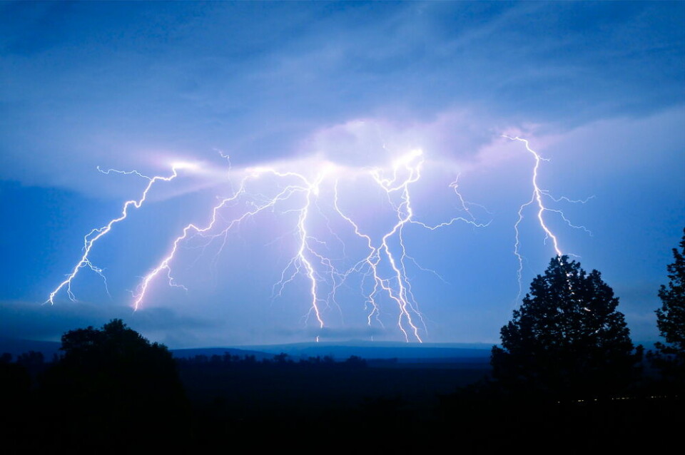 Lightning over countryside. Orange alert for storms in northwest and central France