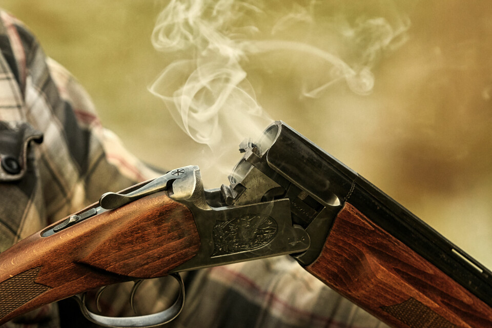 A hunting rifle being opened after shooting