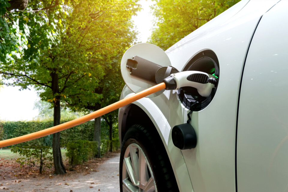 Charging an electric car with the power cable supply plugged in