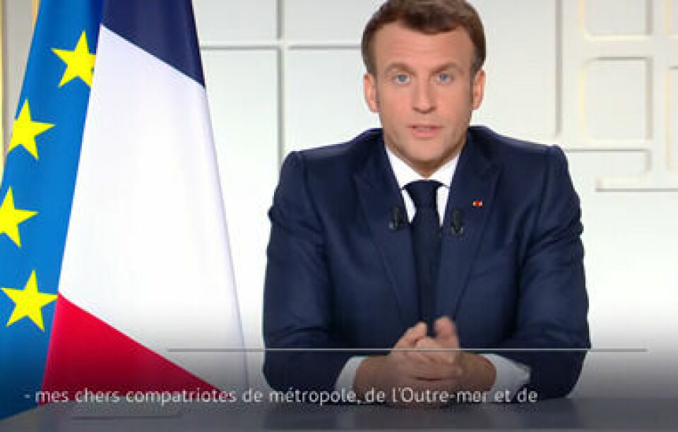 President Macron speaking in a televised address. Macron: Semi-confinement to extend to all France, schools to close