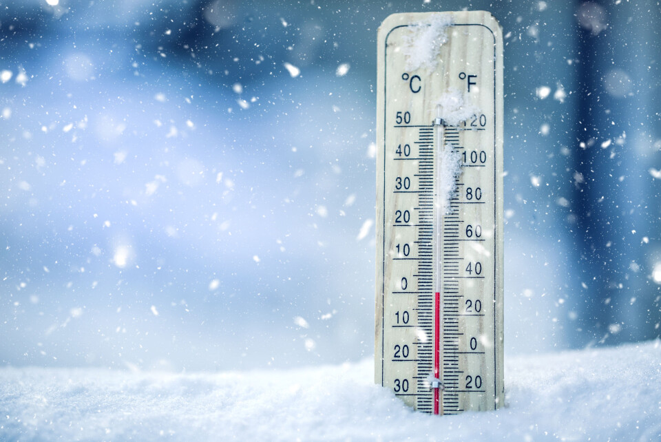 Marian Weyo / Shutterstock An image of a thermometer amid freezing temperatures