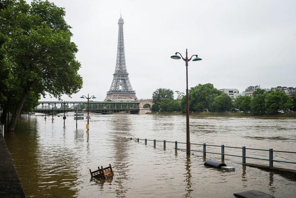 An image of the Seine after a flood, with the Eiffel Tower in the background