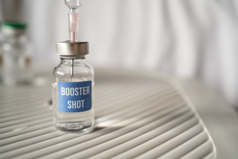 Wachiwit / Shutterstock A syringe in a vial of liquid labelled ‘Booster Shot’