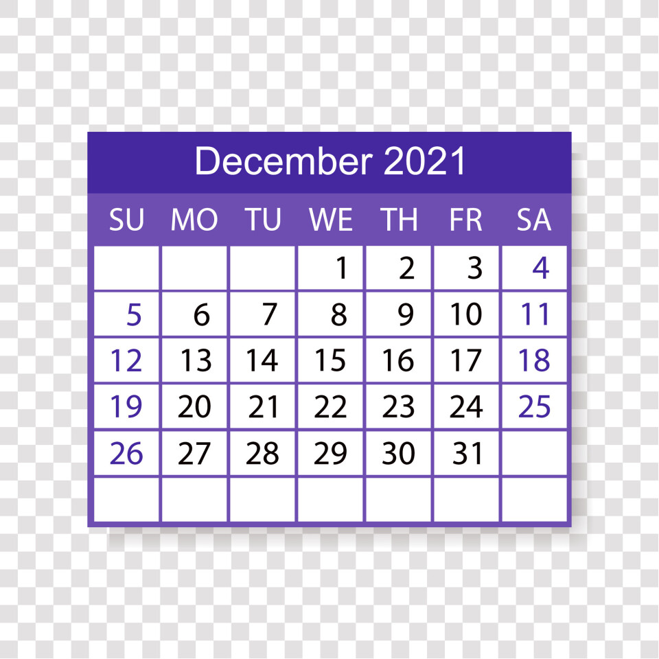 TanyaBegun / Shutterstock A desk calendar showing December with Christmas tree decorations next to it
