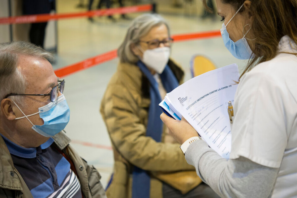 Obatala-photography / Shutterstock Two people at a vaccination centre in France