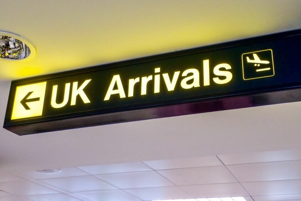 UK arrival's sign at an airport