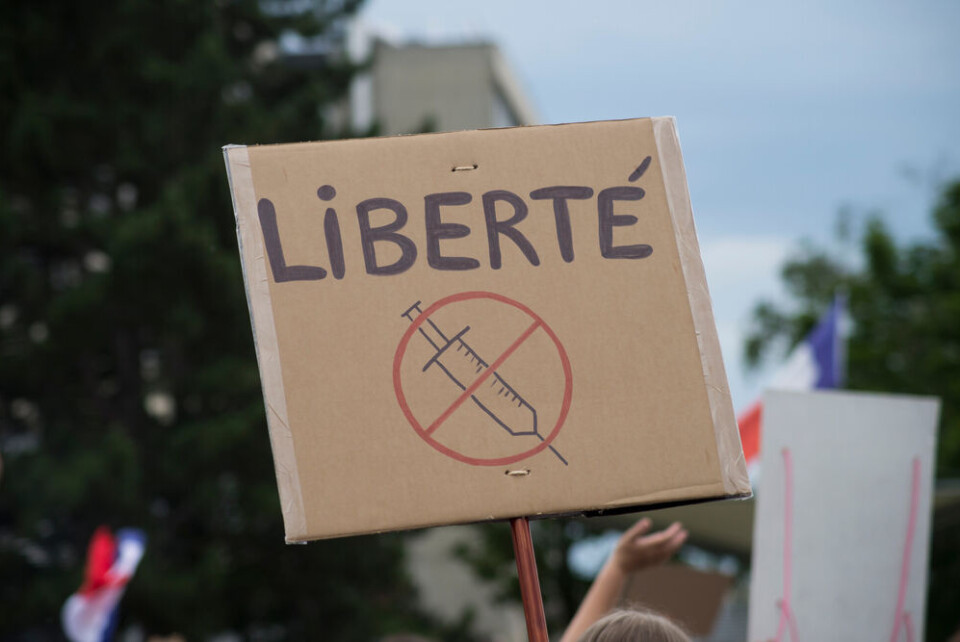 NeydtStock / Shutterstock people protesting in the street against the health pass. Third weekend of protests in France against health pass rules
