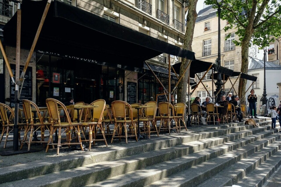 A restaurant terrace in Paris. Macron to confirm reopening dates for France in interview in coming days