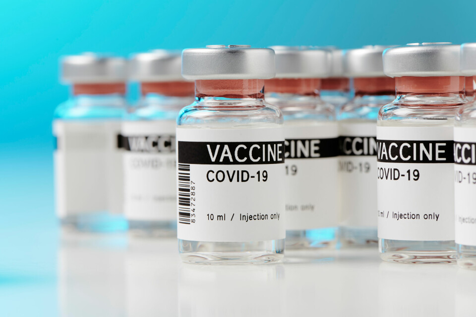 An image of vials holding the coronavirus vaccine