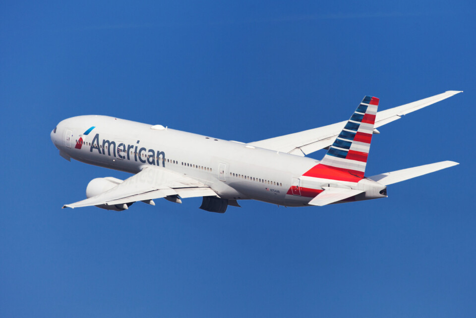 An American Airlines plane Boeing 777 takes off