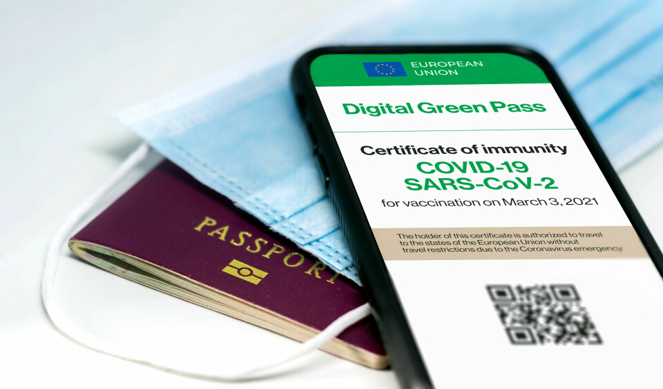 Passport, mask and digital health pass. EU Covid health pass approved for travel use from July 1