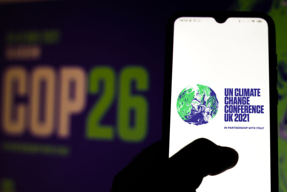 Rafapress / Shutterstock the 2021 United Nations Climate Change Conference (COP26) logo seen displayed on a smartphone