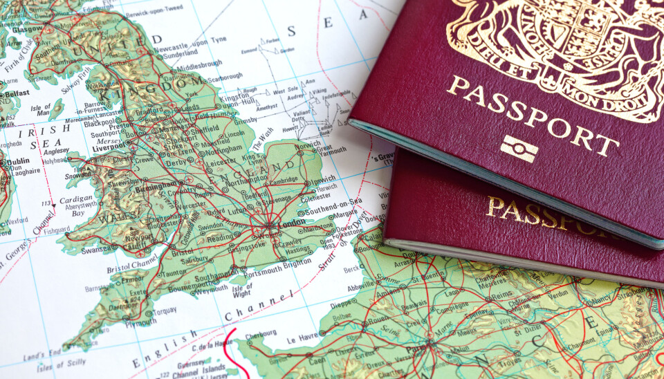 Brian A Jackson/Shutterstock Two British passports lying on a map of the UK and France