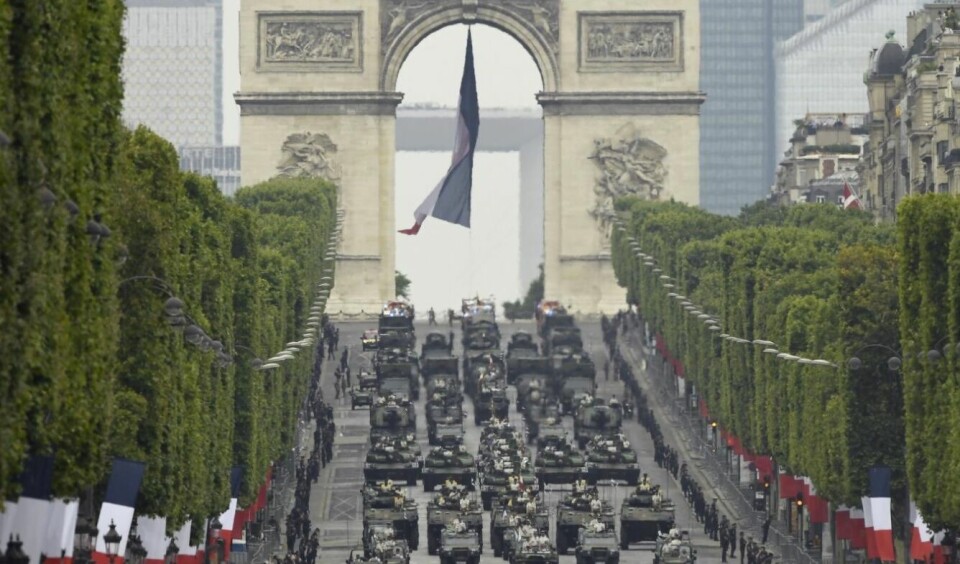 Tanks travel down the Champs-Elysees. Military parade but no fireworks: How France is celebrating July 14