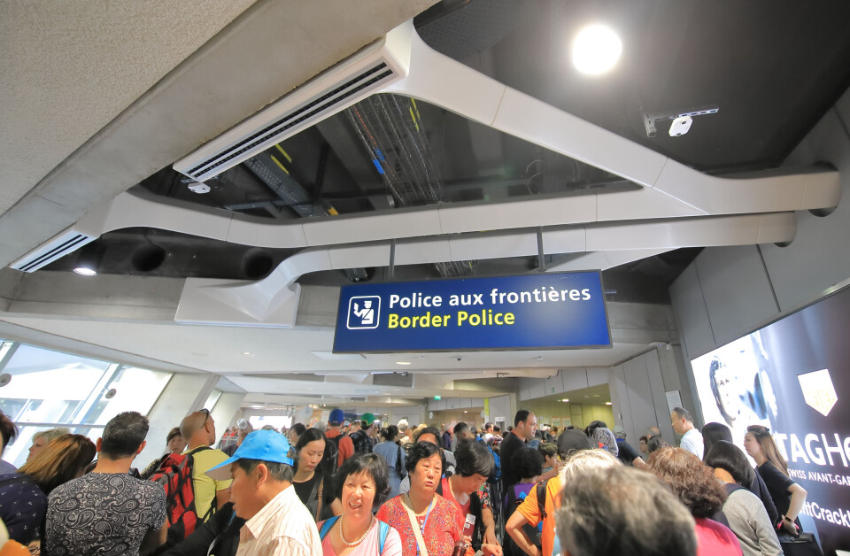 TK Kurikawa / Shutterstock Passengers wait in line for police checks at a Paris airport. Paris airport head fears ‘apocalyptic' delays due to Covid checks in summer