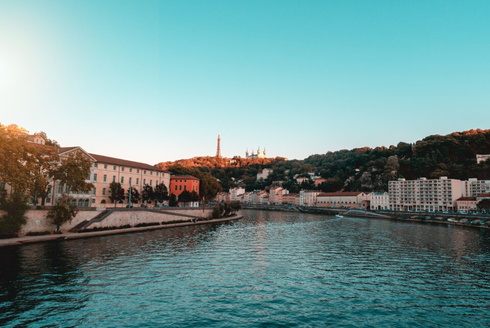 @mtk402 / Mitchell Henderson / Unsplash Sun shine over the river in the 9th arrondissement of Lyon. Lyon allows first official squat in building awaiting renovation