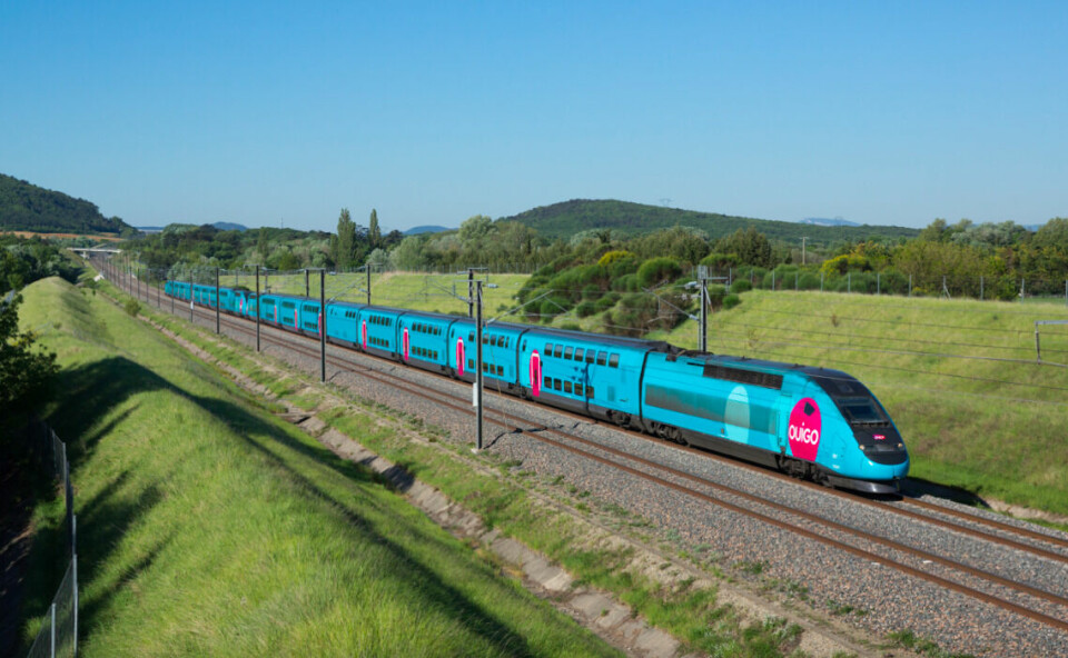 Ouigo train travelling through countryside. Five million discount TGV and other train tickets go on sale in France