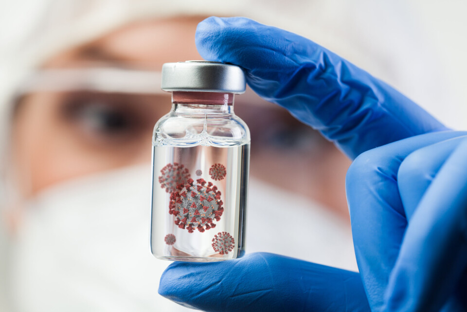 Cryptographer / Shutterstock A scientist holding a vial containing a 'Covid variant'