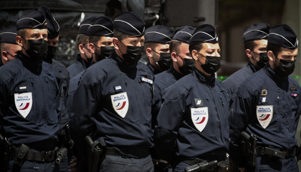 Police line up at the memorial for killed police officer Eric Masson. France doubles penalties for people who do not obey police instructions