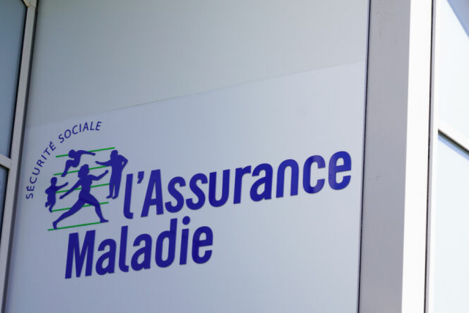 An Assurance maladie sign on the side of a building as part of a guide to healthcare in France 2021