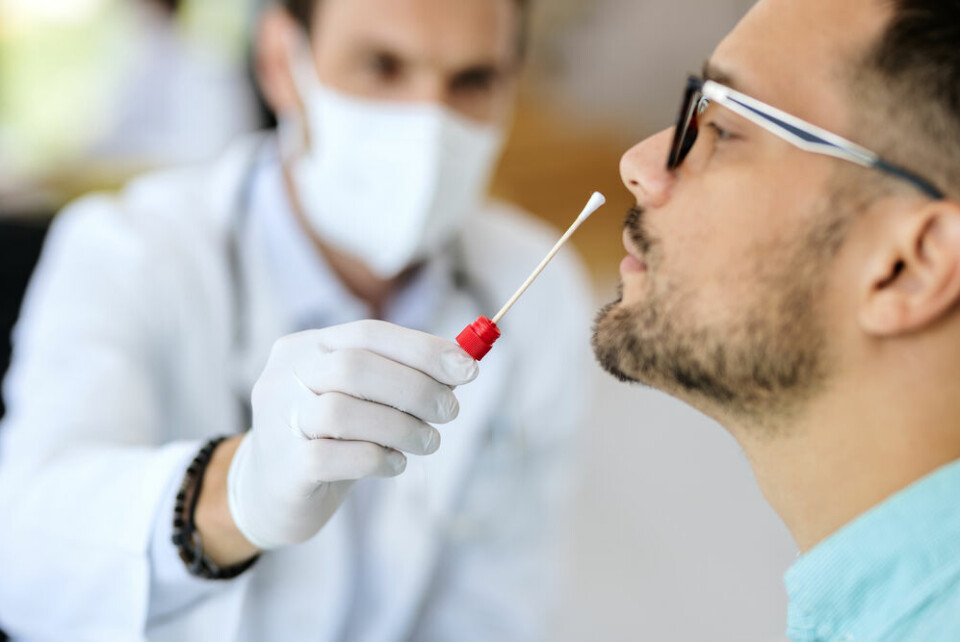 A man being tested for Covid using a nasopharyngeal swab