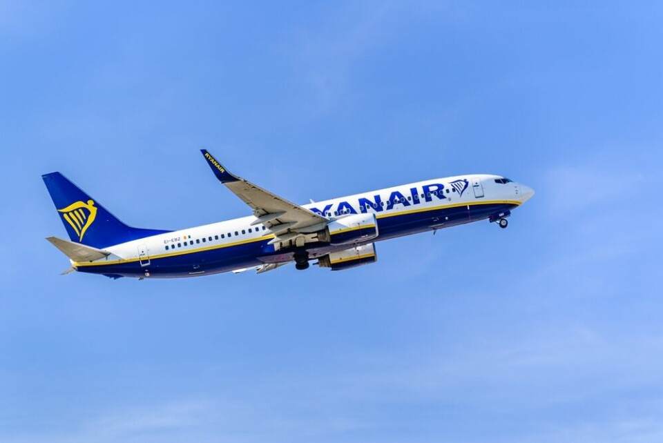 A view of a Ryanair plane in a blue sky