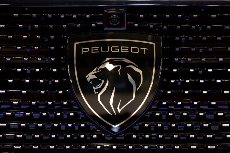 Belish / Shutterstock A view of the new Peugeot logo on the front of a car