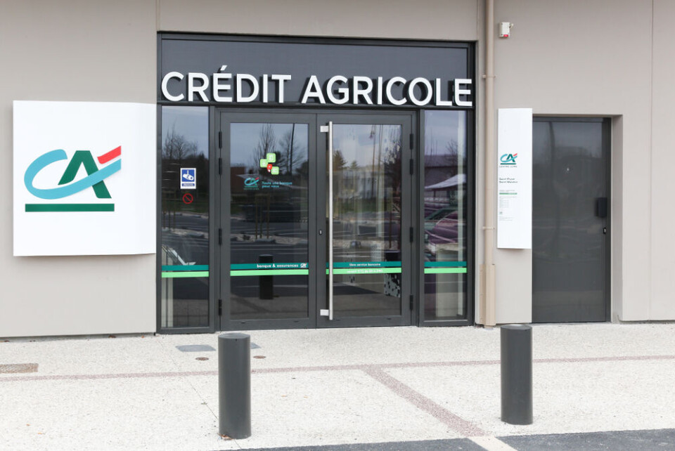 Ricochet64 / Shutterstock A view of the front of a branch of Crédit Agricole