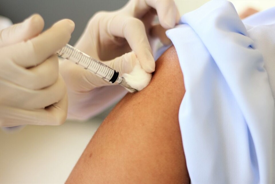 DonyaHHI / Shutterstock A view of someone being vaccinated, with some cotton wool covering their injection site
