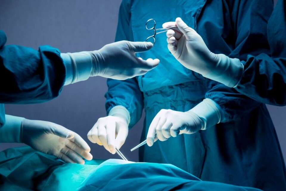 A view of surgeons operating on a patient