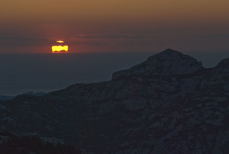 The Pyrenees mountains seen against the setting sun