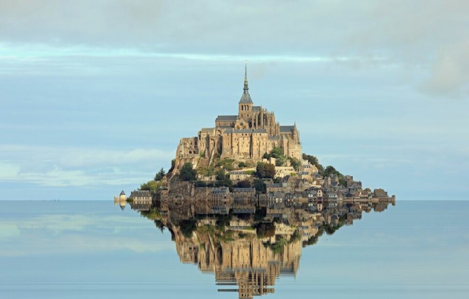A view of Mont Saint-Michel surrounded by water