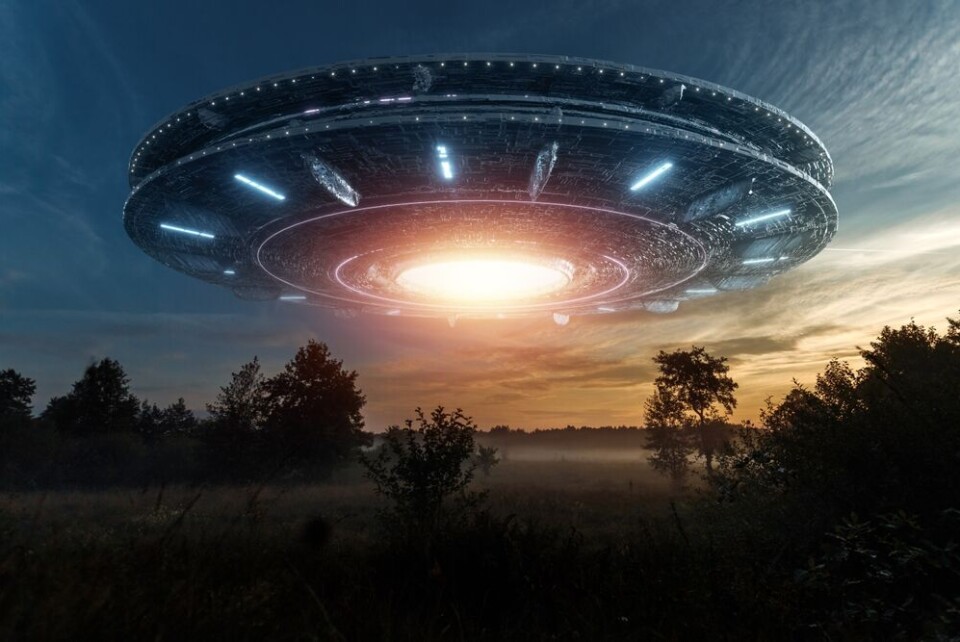Marko Aliaksandr / Shutterstock A graphic showing a stereotypical idea of a spaceship hovering over fields