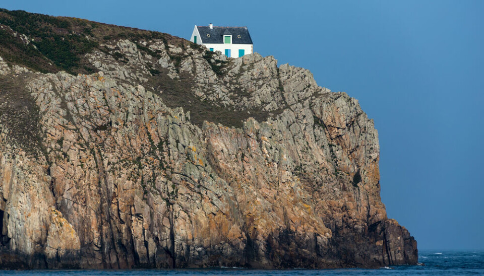 A view of a house very close to a cliff in north-west France
