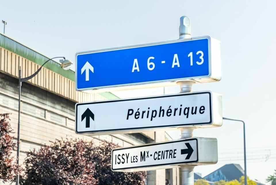 A view of a road sign that says A6-A13 in Paris