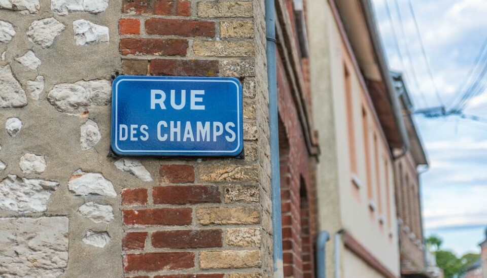 A street sign in a rural French village