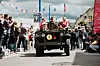 A jeep takes part in a D-Day parade