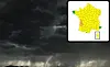 Image of storm and, inset, map of weather alerts in France