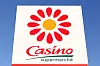 A view of the Casino logo on a sign against a blue sky