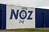 A view of a blue and white NOZ store in Bordeaux, France