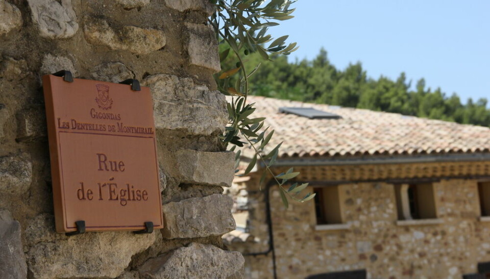 street view with name of road in traditional french village of Gigondas, Provence