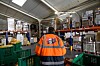 La,Garde,France,12,December,2023:,a volunteer with restos du coeur helps prepare food stores